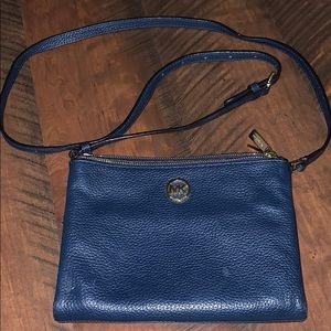 Gently used navy Michael Kors crossbody